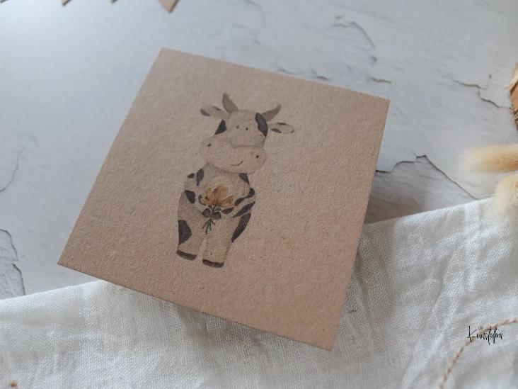 KUH MIT BLUME (AUF KRAFTPAPIER)